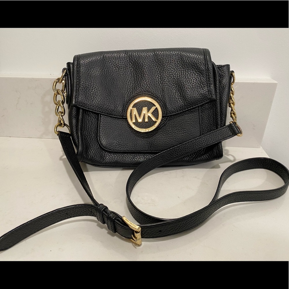 Beautiful Michael Kors black pebbled leather medium crossbody with gold accents